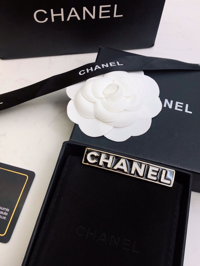Ch*el brooches